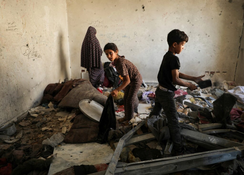 Children’s toys in rubble as Israel strikes Gaza clinic shelter