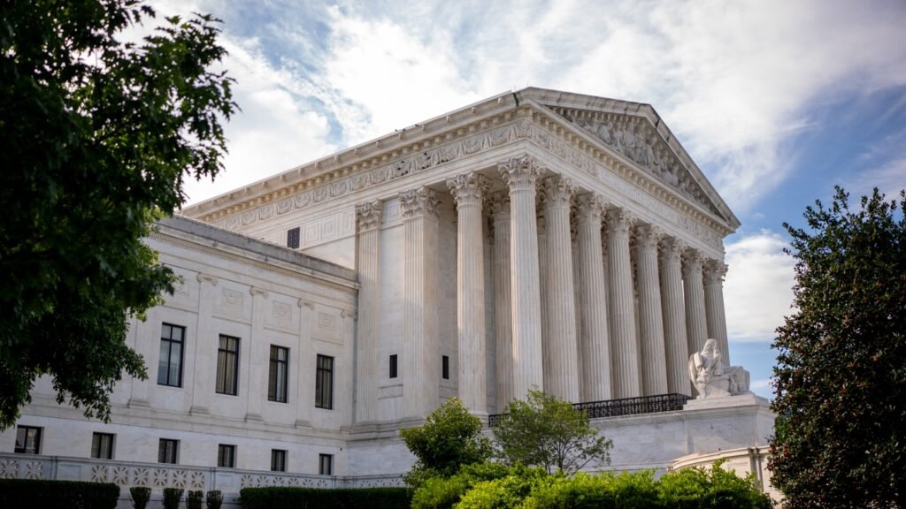 Supreme Court says Trump’s government overhaul can go forward for now : NPR