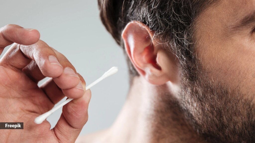 Is it advisable to use cotton swabs, with or without oil, to clear your earwax?